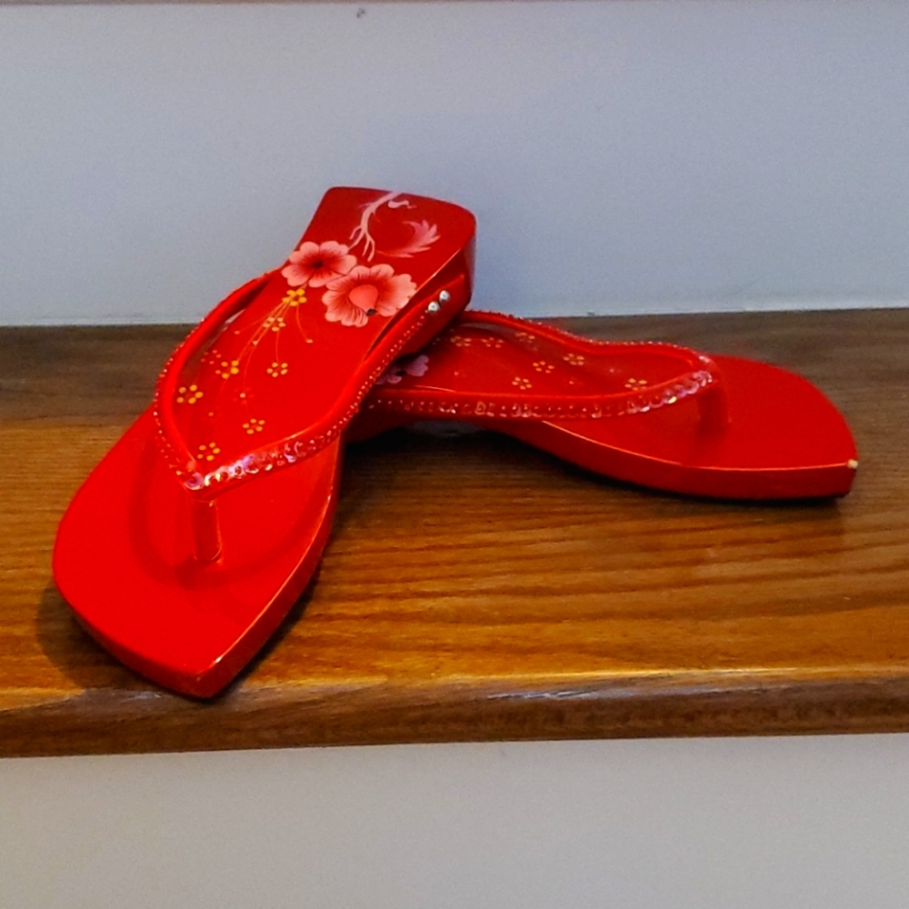 Red wooden painted Asian sandals